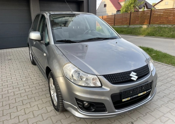 Suzuki SX4 cena 29990 przebieg: 200000, rok produkcji 2011 z Skawina małe 232